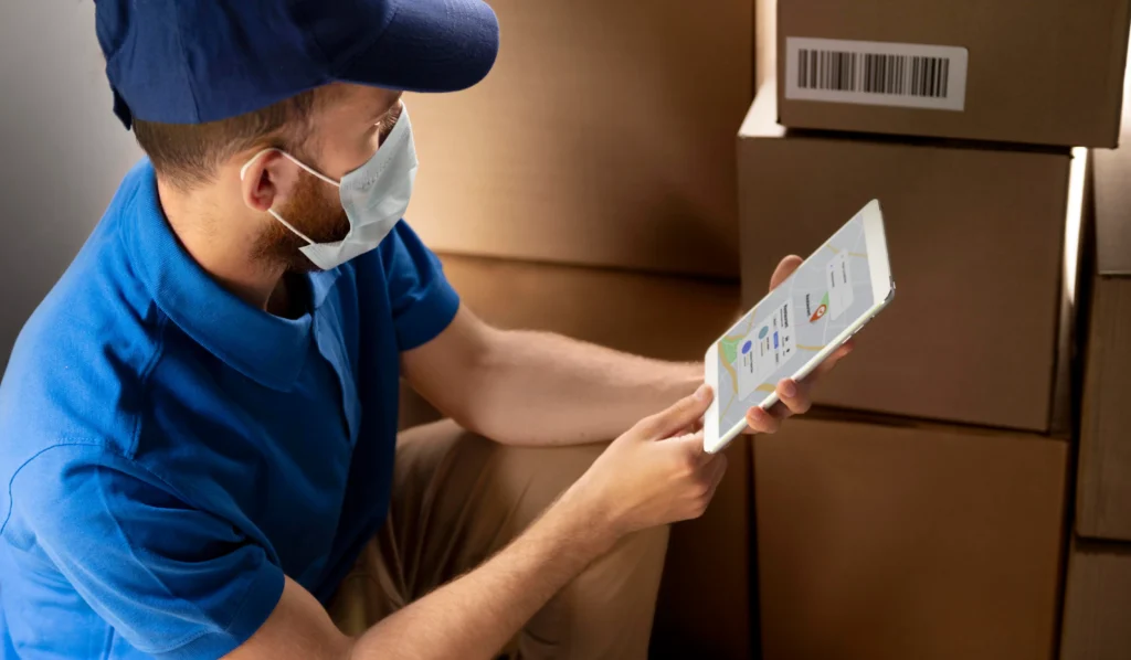 Smart WMS India — warehouse worker using handheld terminal